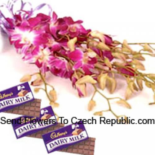 Lindas orquídeas rosadas con chocolates Cadbury